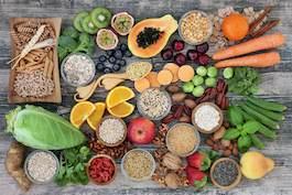 different fruits, vegetables, and grains on a table