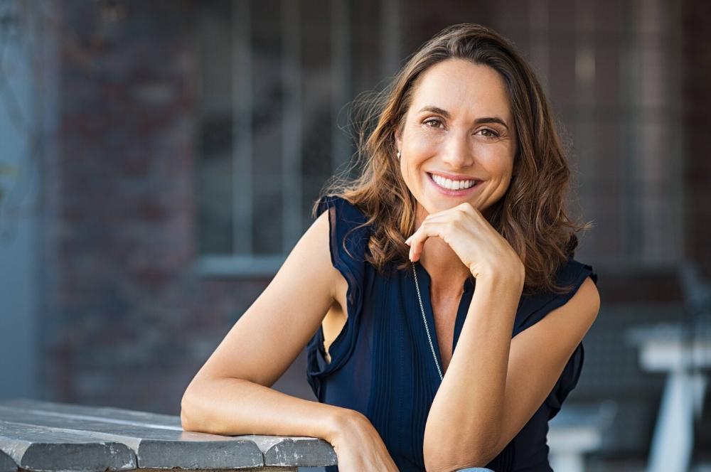 woman smiling while sitting outside in barrie