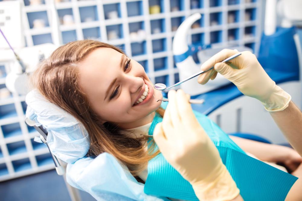 Woman smiling in dental chair in barrie on