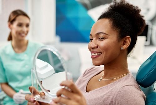 woman sitting in dental chair