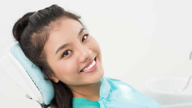 barrie woman smiling in dental chair