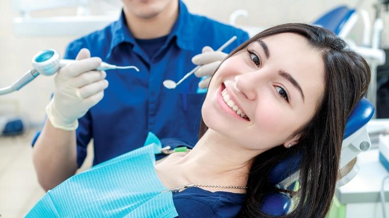 woman in dental chair in Barrie