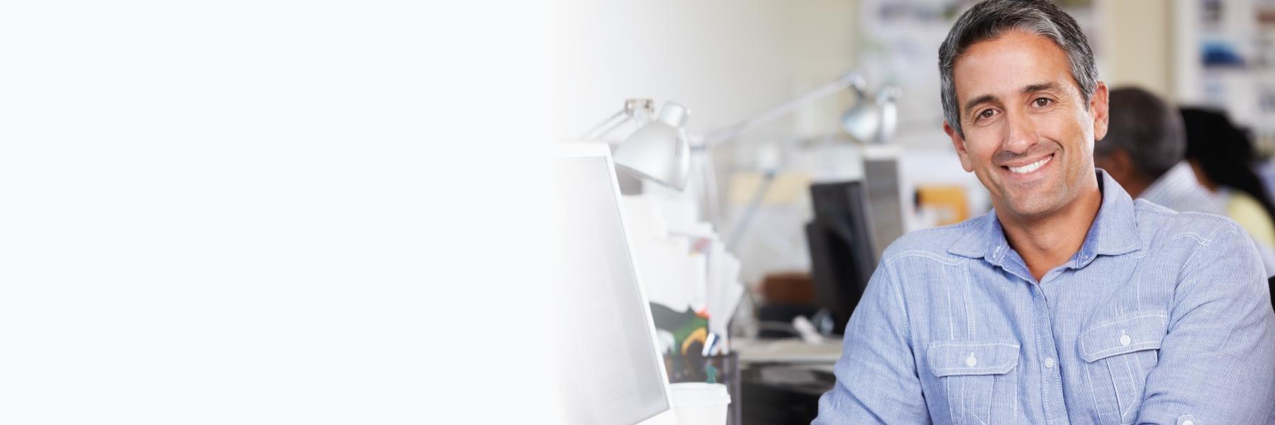 Man smiling in office in barrie